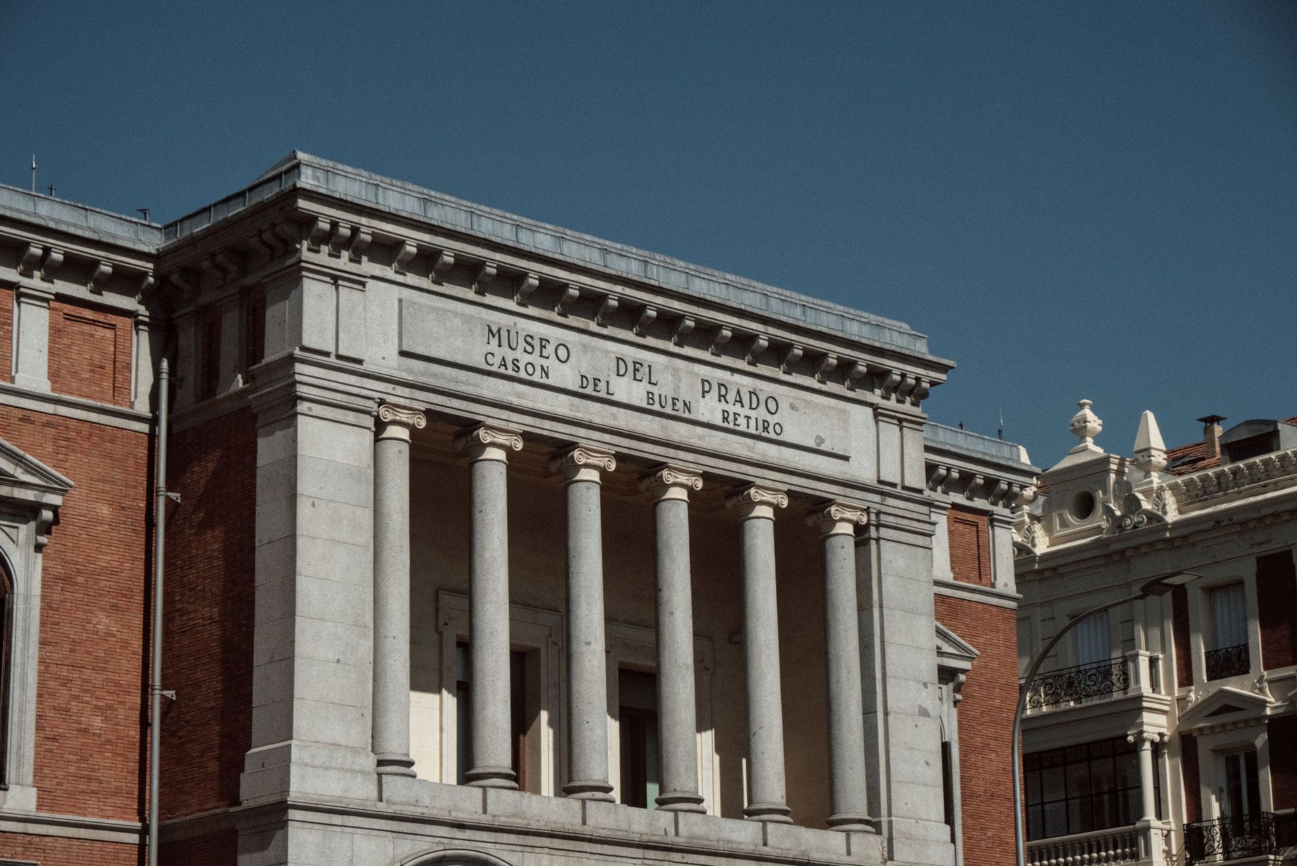 Elegant neoclassical facade of Cason del Buen Retiro, part of Museo del Prado, Madrid.